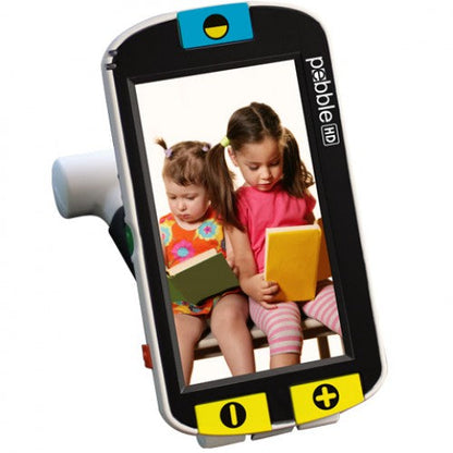 Pebble HD in folded position showing saved photo of two little girls reading books.